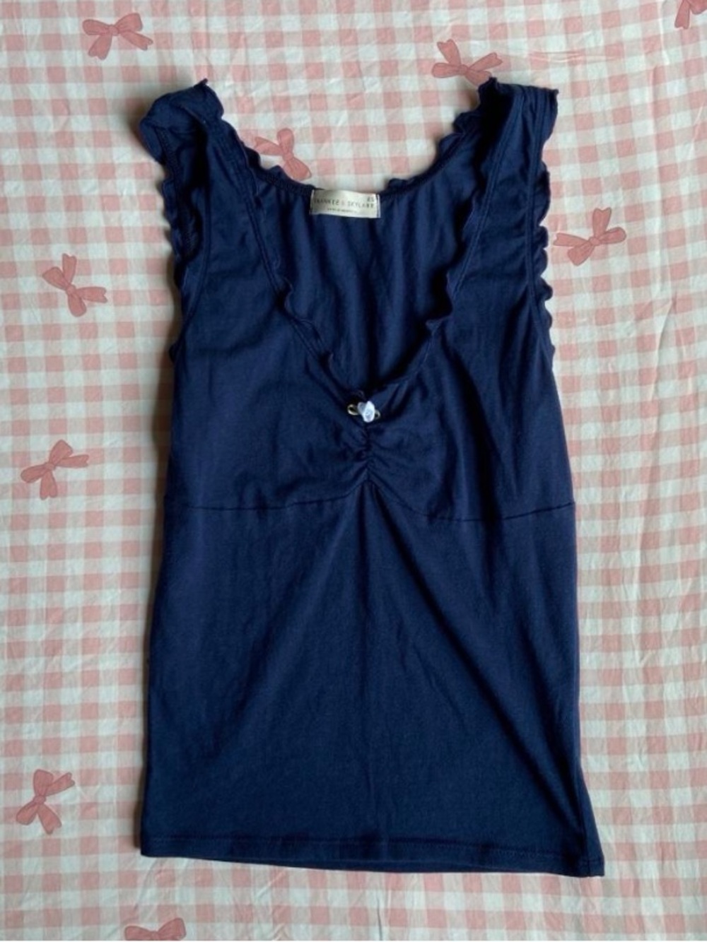Navy blue babydoll top with ruched details